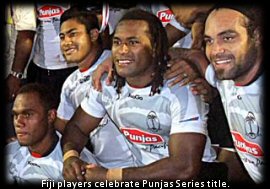 Fiji players (L-R) Leone Nakarawa, Ravai Fatiaki, Albert Vulivuli and Netani Talei celebrate claiming the 2011 Punjas Series title